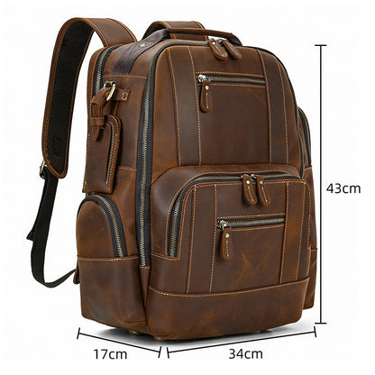 Brown leather backpack with measurements on a white background