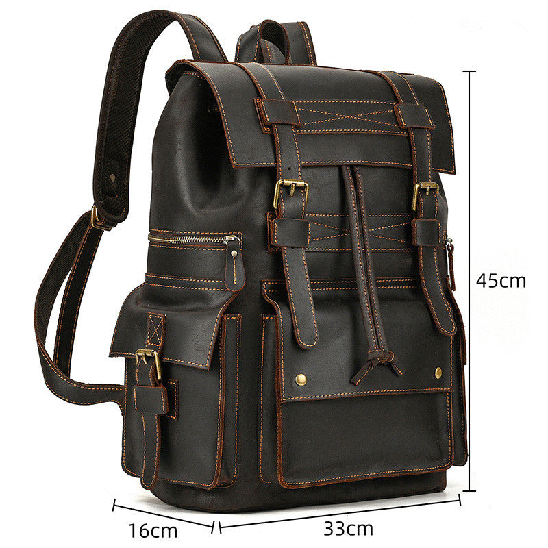 Vintage brown leather travel backpack with front pockets and buckle straps, 45x33x16cm