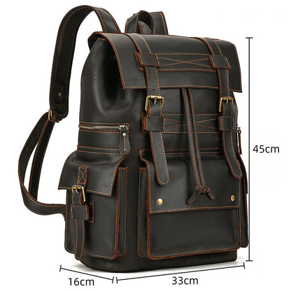 Vintage brown leather travel backpack with front pockets and buckle straps, 45x33x16cm
