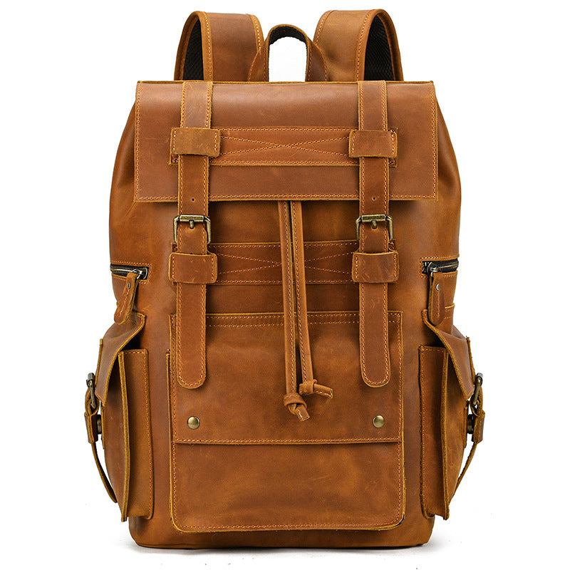 Brown leather backpack on a white background