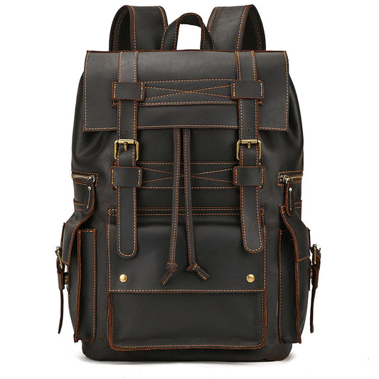 Black leather backpack with brown stitching on a white background