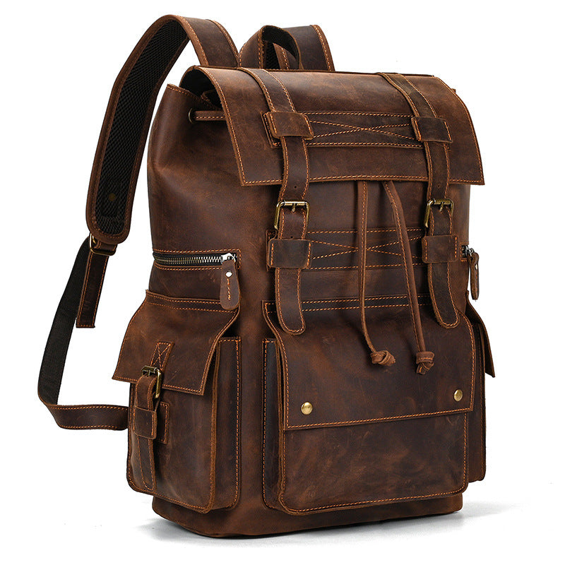 Brown leather backpack on a white background