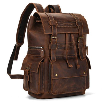 Brown leather backpack on a white background