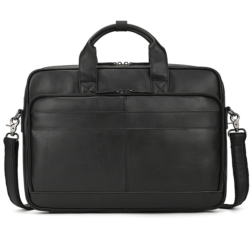 Black leather briefcase with shoulder strap on a white background