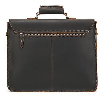 Rear view of the minimal dark brown leather briefcase featuring a full-width zippered back compartment.