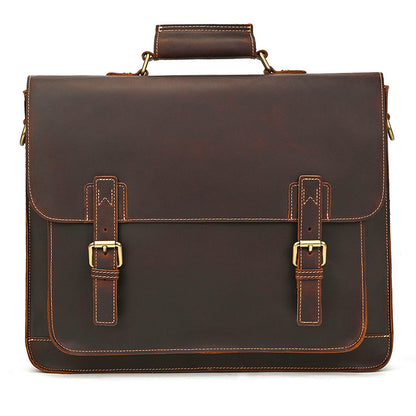 Clean front perspective of slim minimal dark brown leather corporate briefcase on white background.