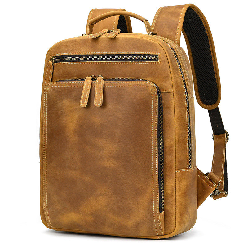 Brown leather backpack on a white background