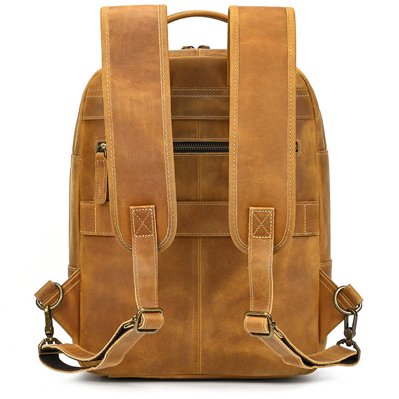 Brown leather backpack on a white background