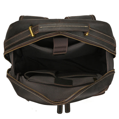 Dark Brown leather backpack with gold stitching on a white background