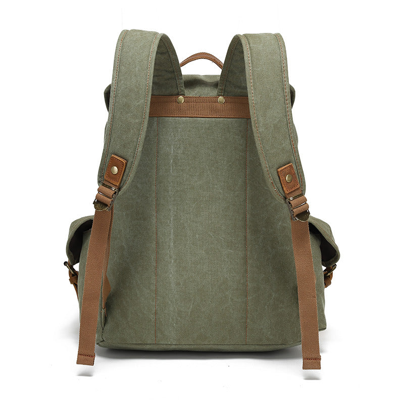 Back view of the Timbercarry vintage canvas multi-pocket backpack in army green, highlighting the adjustable padded shoulder straps and sturdy top handle.