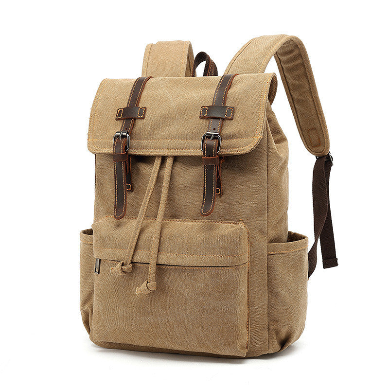 Khaki backpack with leather straps on a white background