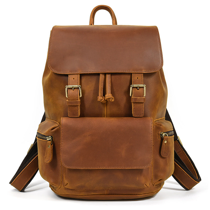 Brown leather backpack on a white background