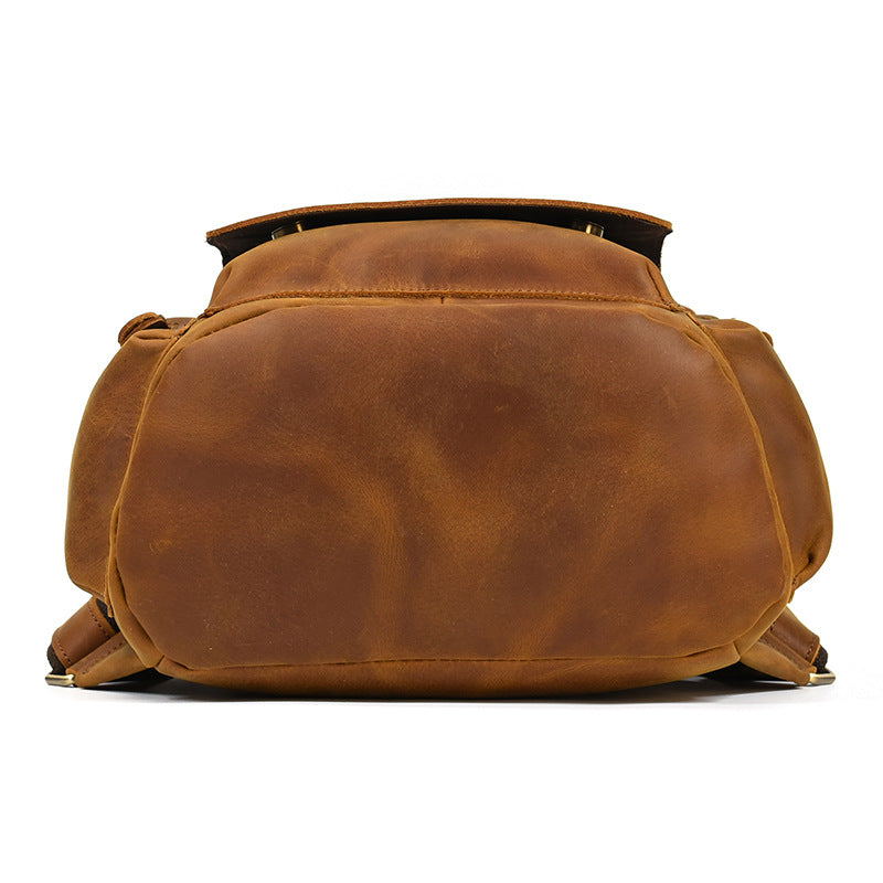 Brown leather bag on a white background