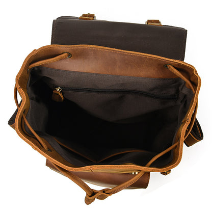 Brown leather bag with open front compartment on a white background