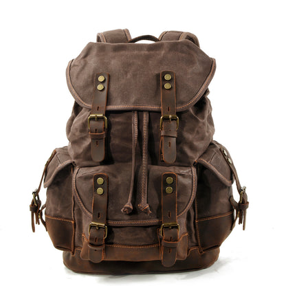 waxed canvas backpack with leather trim vintage travel style in dark brown